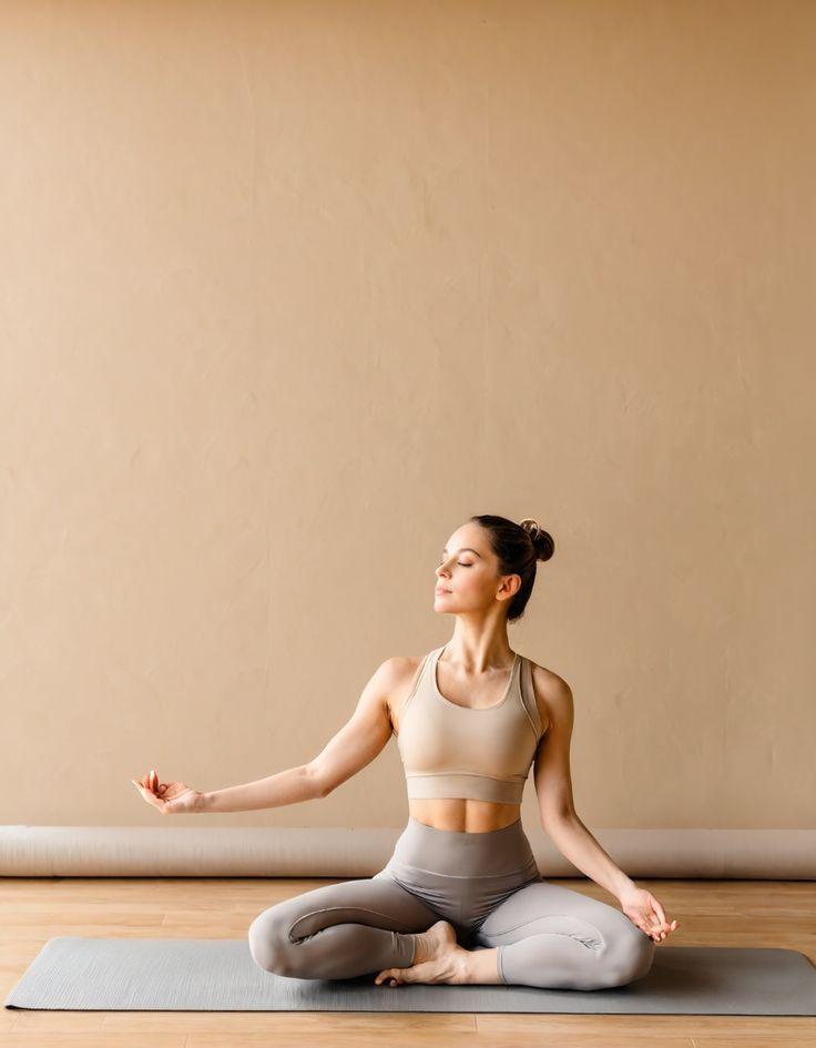 Yoga practitioner in a flowing Vinyasa sequence transitioning between poses with grace